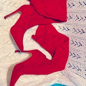Red knee high boots